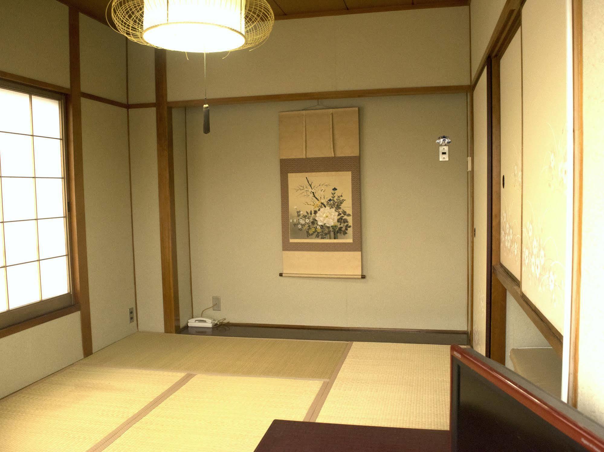 Yamabe Hotel Tenri Bagian luar foto